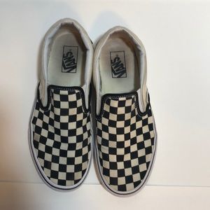 Black checkerboard Vans